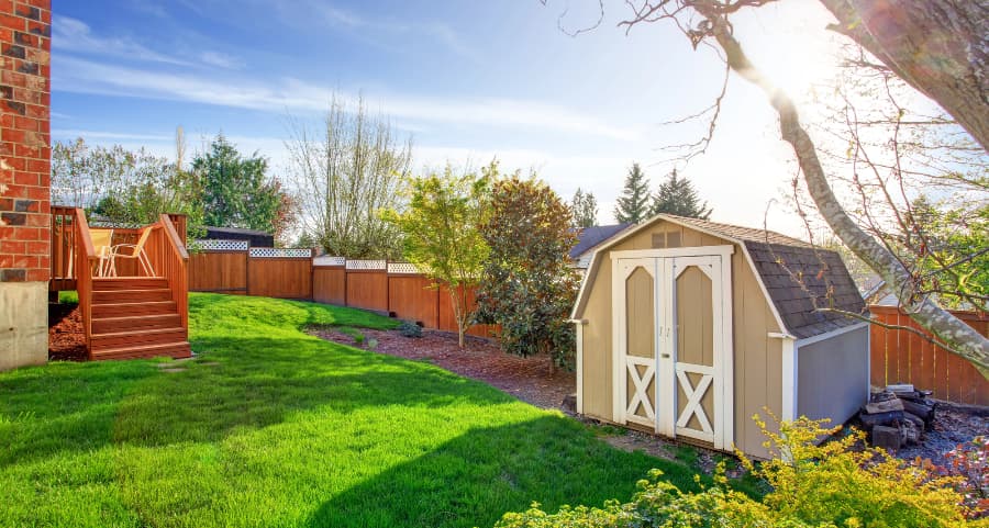 Fenced backyard with storage shed in Lakeland